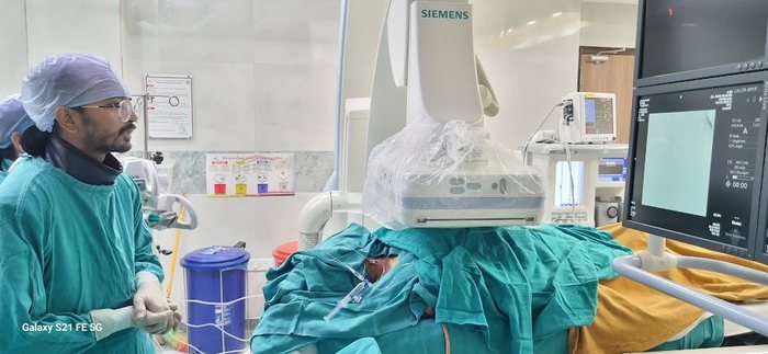 Dr. Bhaskar Das in the interventional radiology suite